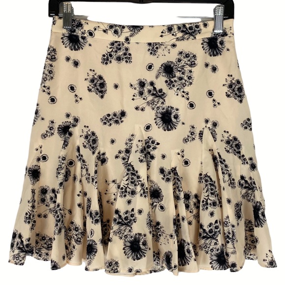 Club Monaco Dresses & Skirts - Club Monaco Cream/Black Floral Pleated Silk Mini Skirt Size 0